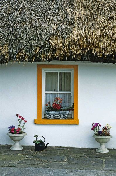 Ireland, Co Clare A thatch-roofed cottage